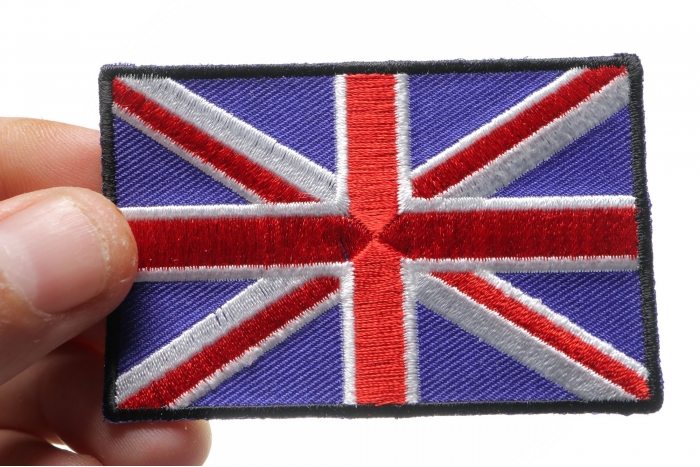 United Kingdom Flag Patch shown on hand for size comparison