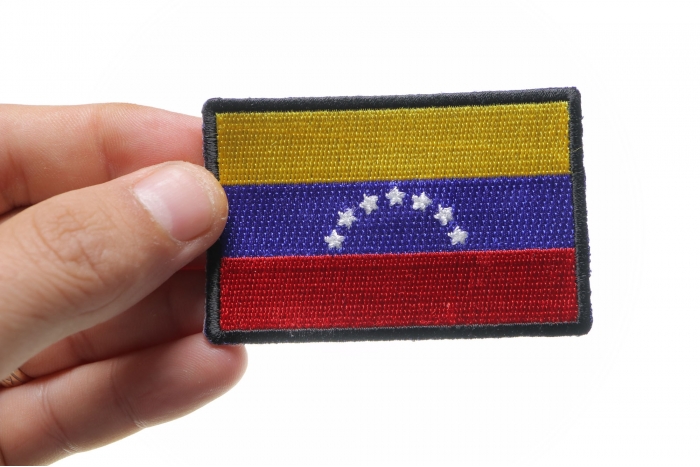 Venezuela Flag Patch shown on hand for size comparison
