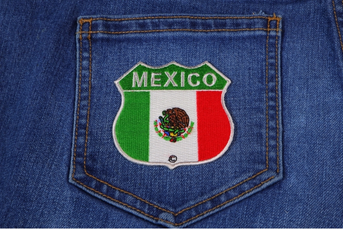 Mexico Shield Flag Patch shown on jeans