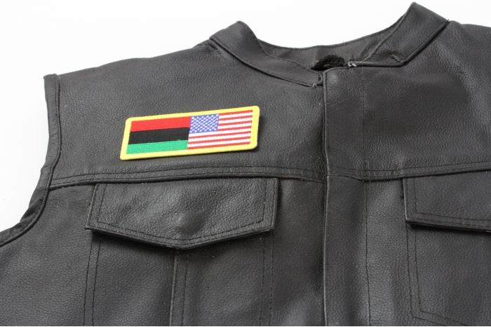 African American Flag Patch - 4x1.75 inch. Embroidered Iron on Patch shown on leather vest