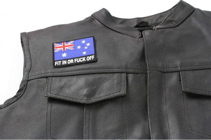 Fit in or Fuck Off Australian Flag Patch - 3x2.6 inch. Embroidered Iron on Patch shown on leather vest