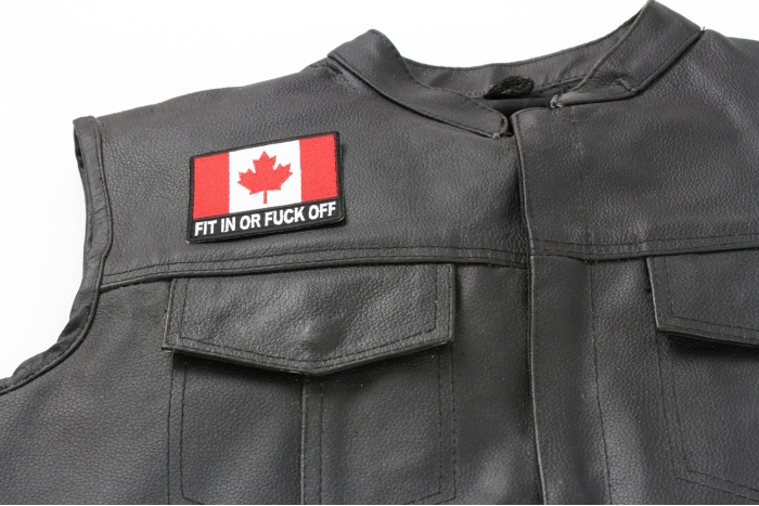 Fit in or Fuck Off Canada Flag Patch - 3x2.6 inch. Embroidered Iron on Patch shown on leather vest
