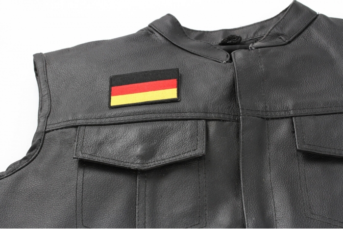 German Flag Patch - 3x2 inch. Embroidered Iron on Patch shown on leather vest