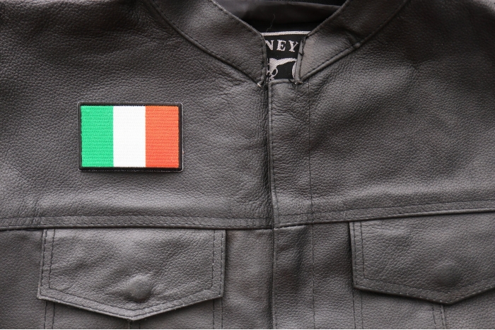 Irish Flag Patch - 3x2 inch. Embroidered Iron on Patch shown on leather vest