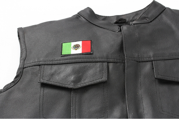 Mexico Flag 2.5 Inch Patch - 2.5x1.5 inch. Embroidered Iron on Patch shown on leather vest