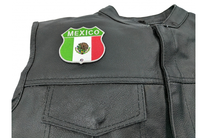 Mexico Shield Flag Patch - 2.75x2.75 inch. Embroidered Iron on Patch shown on leather vest