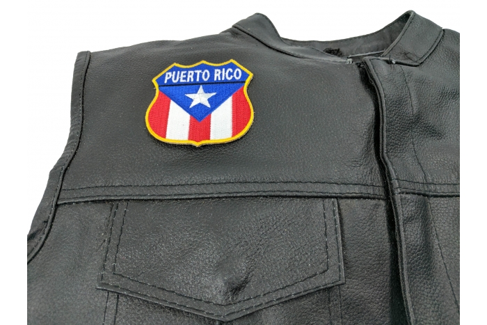 Puerto Rico Shield Flag Patch - 2.75x2.75 inch. Embroidered Iron on Patch shown on leather vest