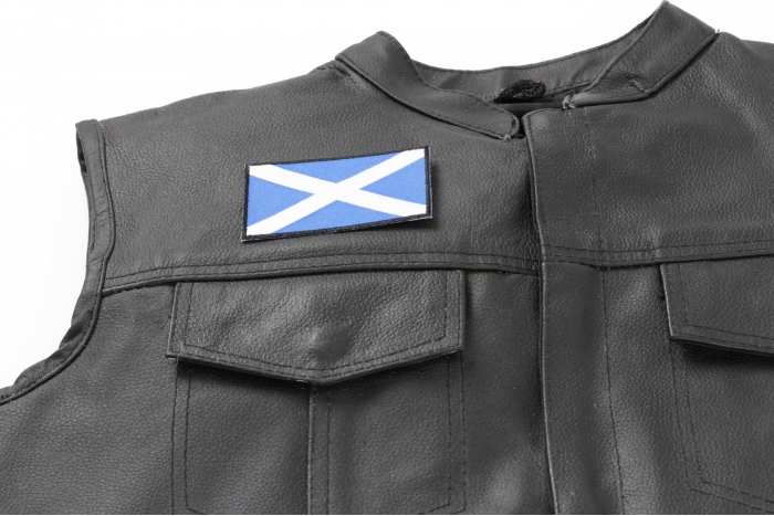 Scotland Flag Patch - 3.5x2.1 inch. Embroidered Iron on Patch shown on leather vest