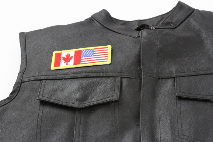 USA Canada Patch - 4x1.75 inch. Embroidered Iron on Patch shown on leather vest