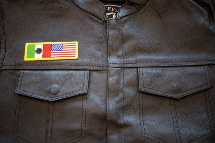 USA Mexico Patch - 4x1.5 inch. Embroidered Iron on Patch shown on leather vest