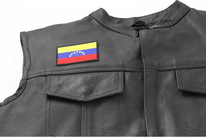 Venezuela Flag Patch - 3x2 inch. Embroidered Iron on Patch shown on leather vest