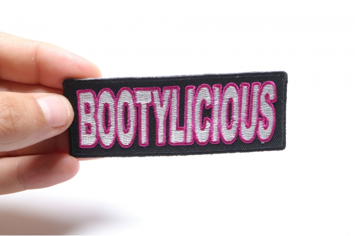 Bootylicious Patch, Funny Patches for Adults shown on hand for size comparison