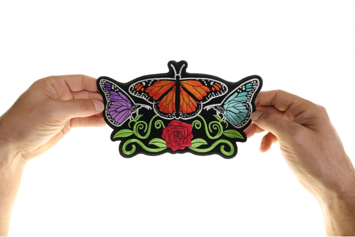 Butterfly Flower Patch, Large Ladies Back Patches for Jackets shown on hand for size comparison