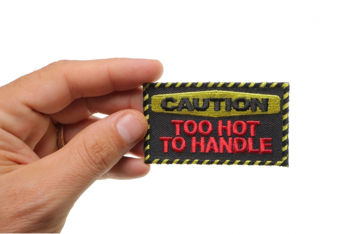 Caution Too Hot To Handle Patch, Funny Patches for Ladies shown on hand for size comparison