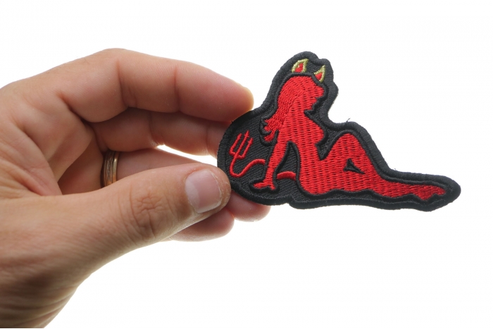 Devil Girl Patch shown on hand for size comparison