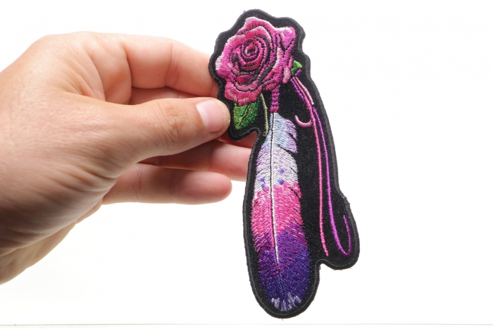 Feather and Rose Pink Patch shown on hand for size comparison