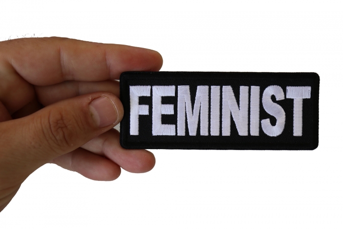 Feminist Patch shown on hand for size comparison
