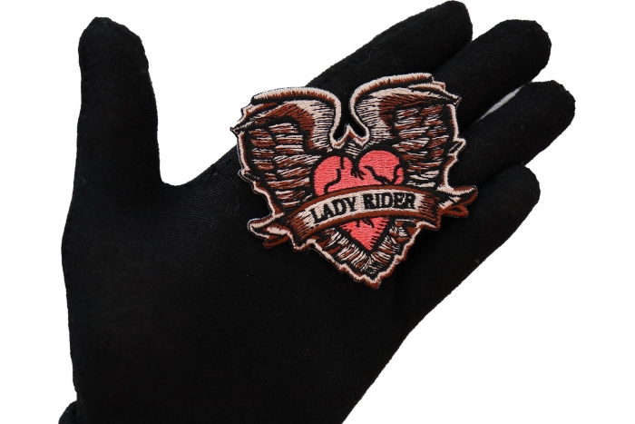 Gothic Heart and Wings Patch shown on hand for size comparison