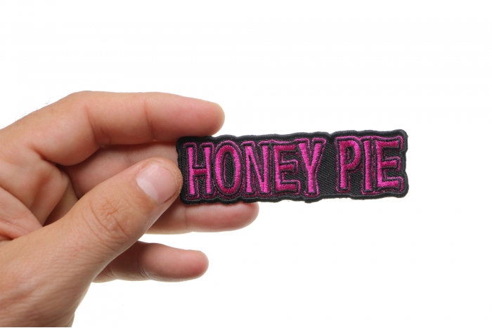  shown on hand for size comparison