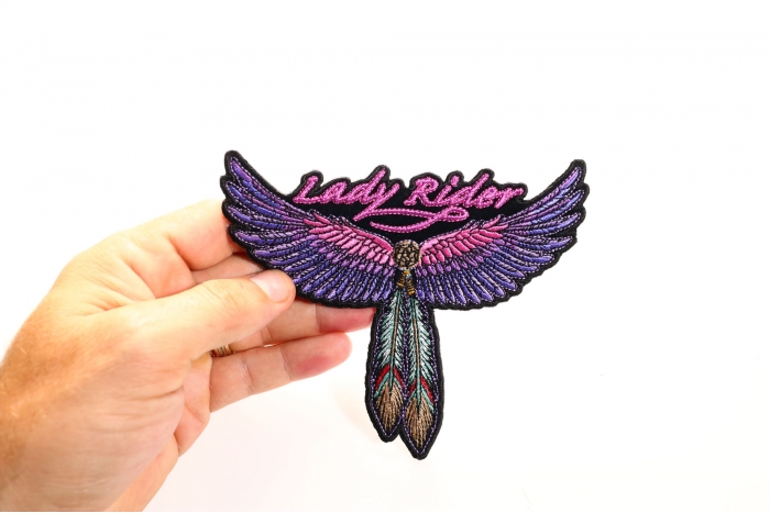 Lady Rider Patch, Sew-on and Iron-on Patch for Jackets, Vests, Shirts shown on hand for size comparison