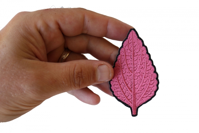 Leaf Iron on Patch shown on hand for size comparison