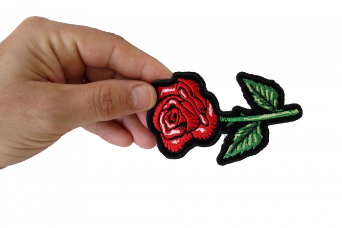 Red Rose Patch shown on hand for size comparison