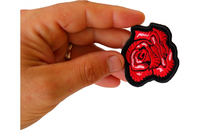 Rose Bud Patch shown on hand for size comparison