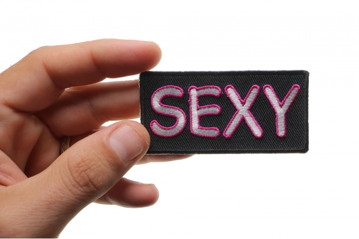 Sexy Patch, Funny Patches for Ladies shown on hand for size comparison