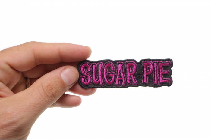  shown on hand for size comparison