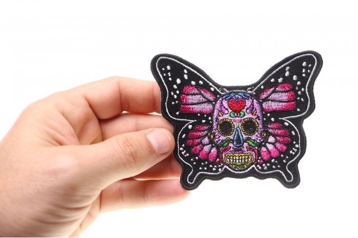 Sugar Skull Butterfly Patch, Biker Skull Patches shown on hand for size comparison