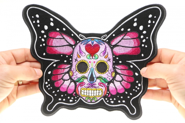 Butterfly Skull Patch, Large Skull Patches for Biker Jackets shown on hand for size comparison