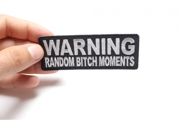 Warning Random Bitch Moments Patch shown on hand for size comparison