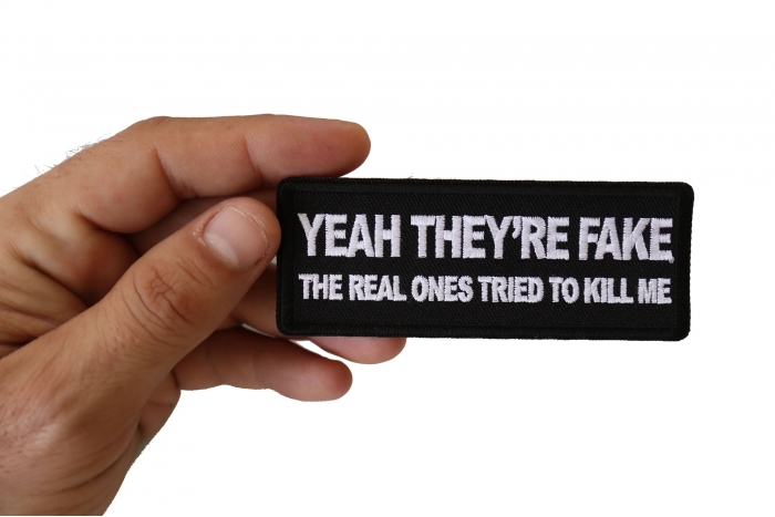 Yeah They're Fake The Real Ones Tried to Kill me Patch, Funny Saying Patches shown on hand for size comparison
