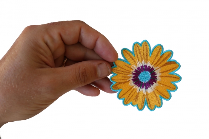  shown on hand for size comparison