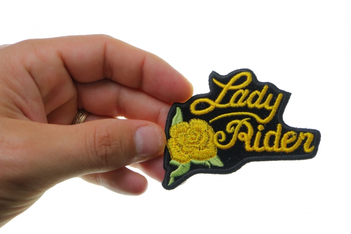 Yellow Lady Rider Rose Biker Patch shown on hand for size comparison