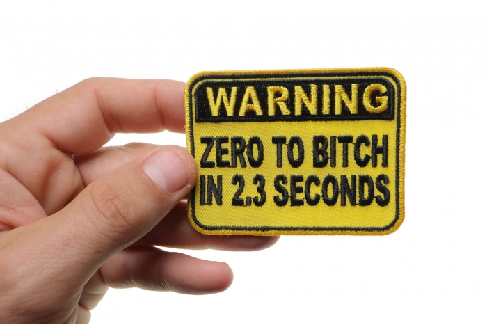 Warning Zero To Bitch In 2 Seconds Patch, Funny Patches for Adults shown on hand for size comparison