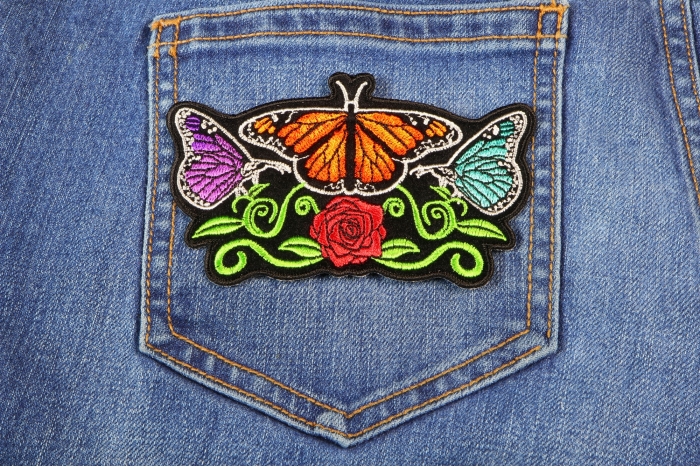 Butterflies and Flower Ladies Patch shown on jeans