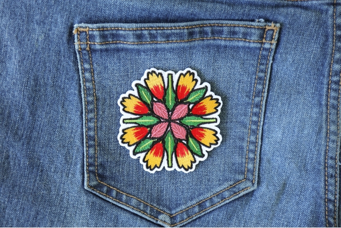 Flower Petals and leaves Mix Iron on Patch shown on jeans