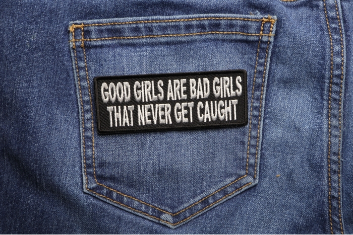 Good Girls Are Bad Girls That Never Get Caught Patch shown on jeans