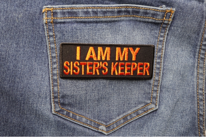 I am my Sister's Keeper Patch in Orange shown on jeans