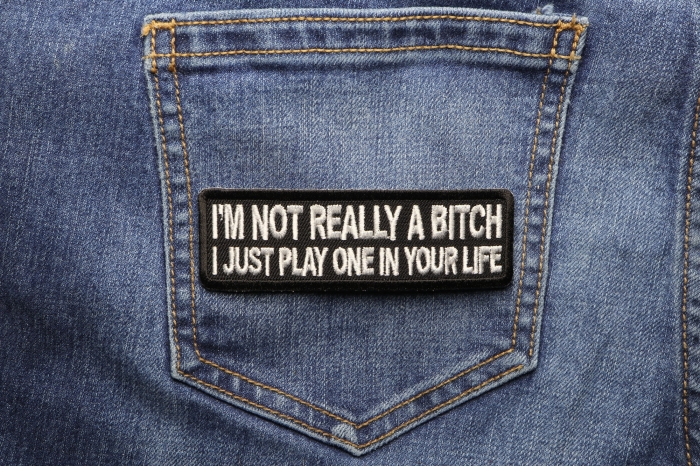 I'm Not Really A Bitch Just Play One Patch shown on jeans