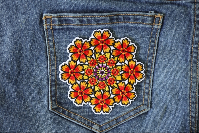 Kaleidoscope Flowers Patch shown on jeans