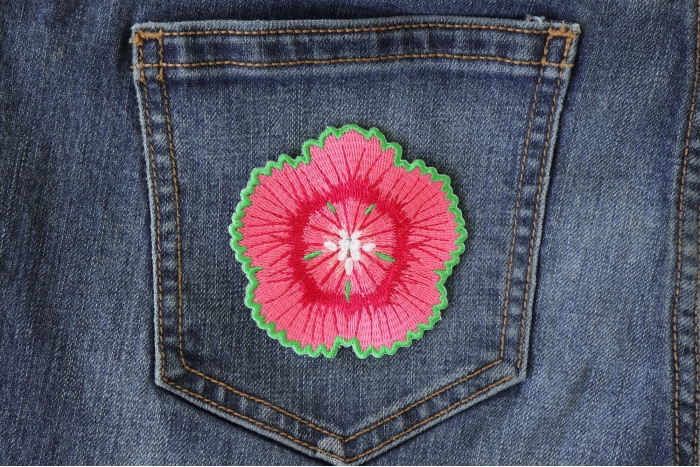 Pink and Green Flower Iron on Patch shown on jeans