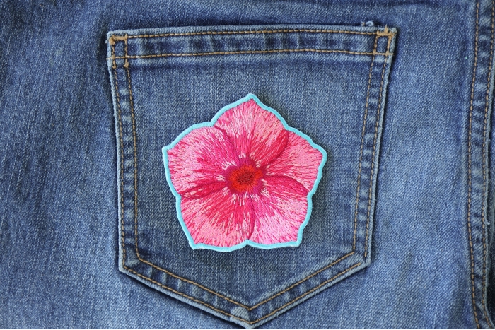 Pink Flower Petal Patch shown on jeans