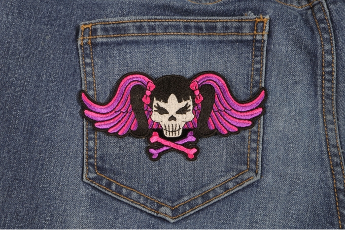 Pigtails Skull and Wings Patch shown on jeans