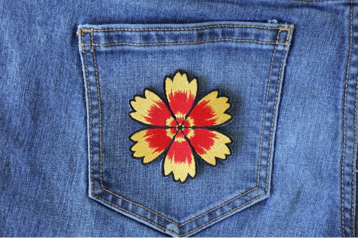 Red Yellow Flower Iron on Patch shown on jeans
