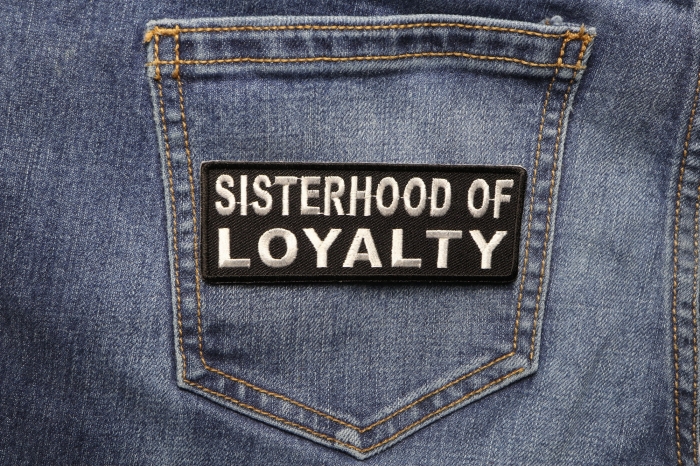 Sisterhood Of Loyalty Patch shown on jeans