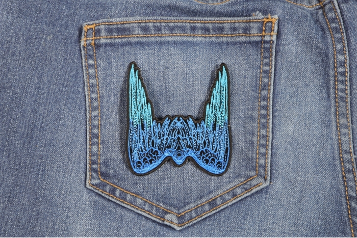 Small Angel Wings Biker Patch Blue shown on jeans