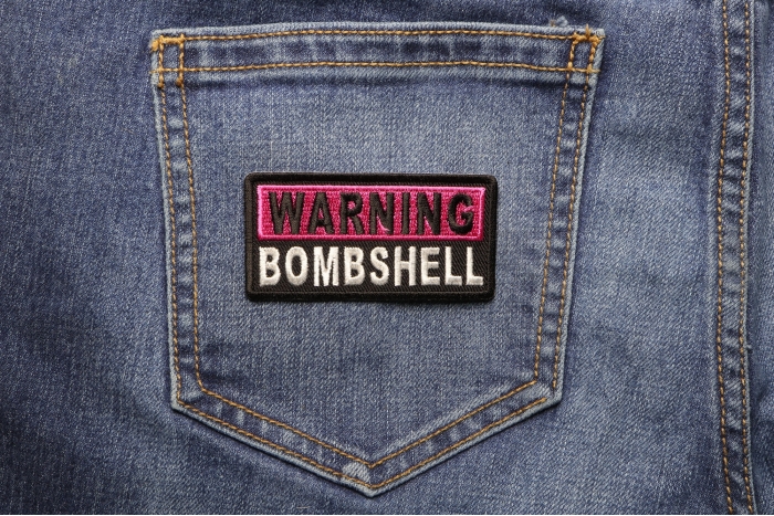 Warning Bombshell Patch shown on jeans