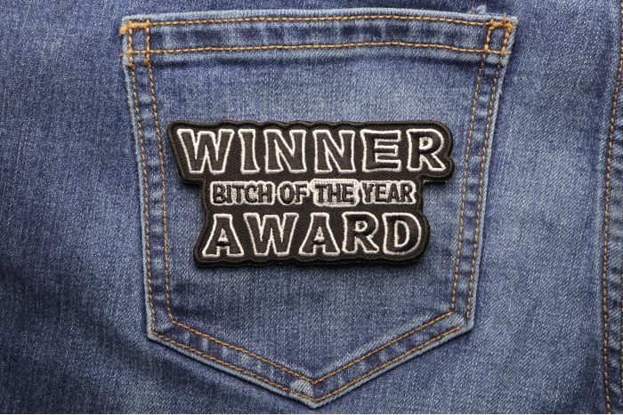 Winner Bitch Of The Year Award Patch shown on jeans